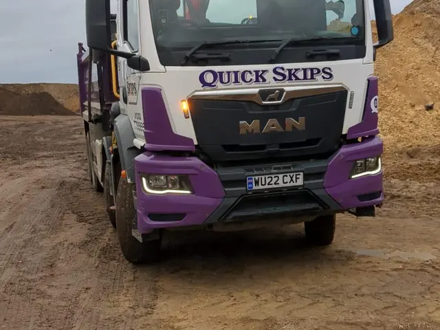 Quick Skips grab lorry on site near Winton